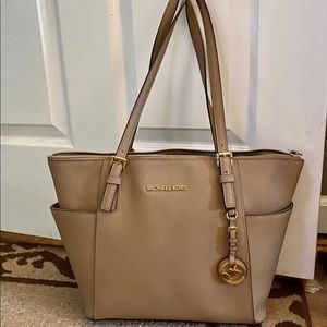 Michael Kors Like New Tan Messenger bag.